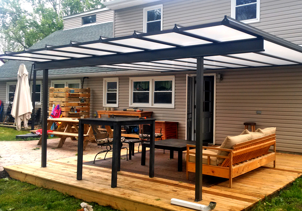 Backyard Patio Cover in black with translucent patio roof