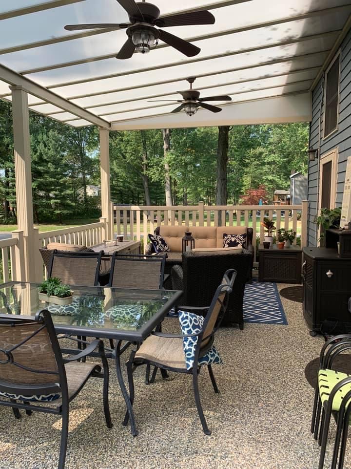 patio with seating area and deck awning