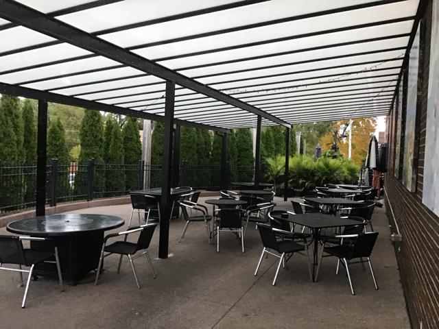 Outdoor seating area with patio awning